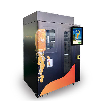 Máquina expendedora recientemente exprimida automática del zumo de naranja para el anuncio publicitario